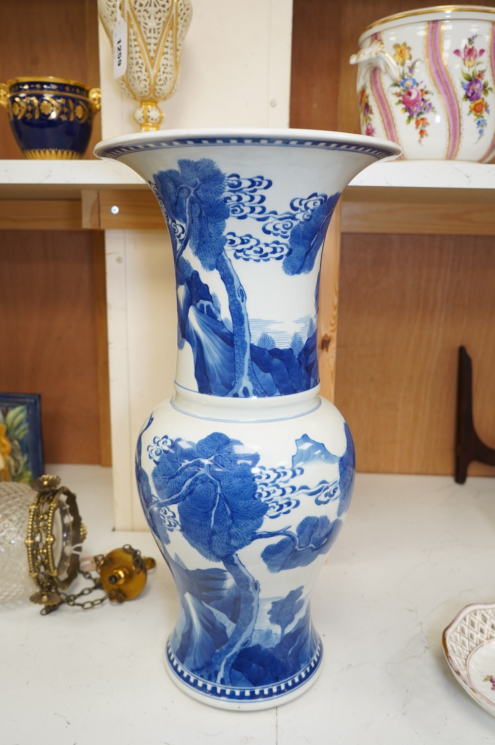 A Chinese blue and white yen yen vase, Kangxi mark but later, 46cm. Condition - crazing to rim, otherwise good